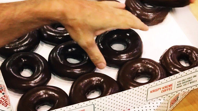 Krispy Kreme Canada Unveils Chocolate Glazed Doughnuts To Coincide With Solar Eclipse