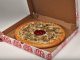 Boston Pizza Launches New Christmas Carolling Pizza Box